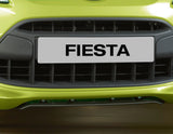 Original Ford Fiesta Difusor de paragolpes delantero en color negro.