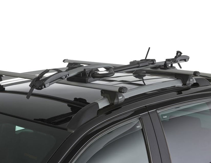 Thule®* Portabicicletas para techo Expert 298.
