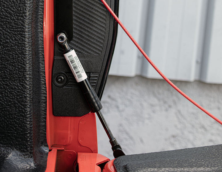 Ranger Pickup Attitude* Amortiguador para el portón del maletero con mecanismo de apertura controlada.