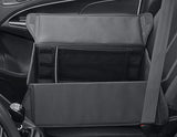 Caja organizadora plegable de tela en color negro, con óvalo Ford en color blanco a ambos lados.