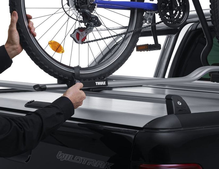 Thule®* Portabicicletas para techo Expert 298.