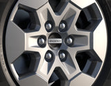 Embellecedor de rueda en color negro, con inscripción Ford.