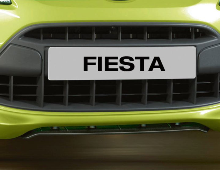 Original Ford Fiesta Difusor de paragolpes delantero en color negro.