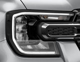 Original Ford Ranger Juego de cubiertas para faros con contorno en color negro mate.