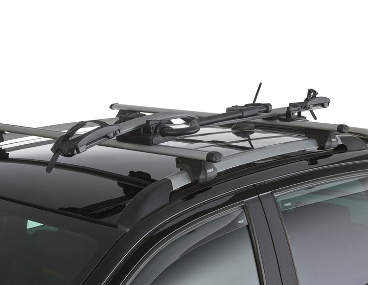 Thule®* Portabicicletas para techo Expert 298.